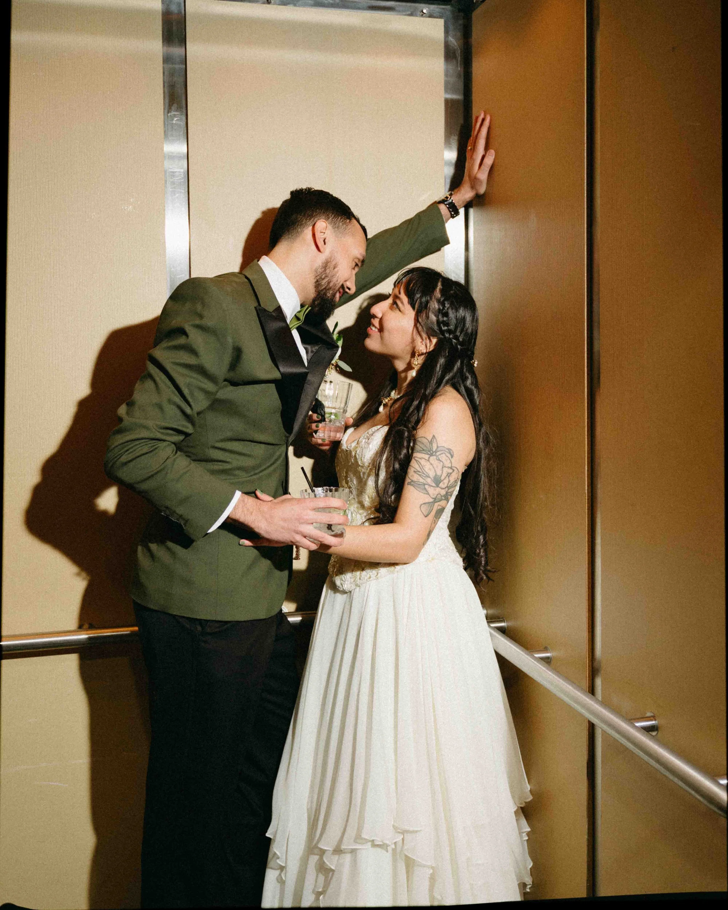 acqua-catering-events-wedding-elevator-kiss-2.jpg