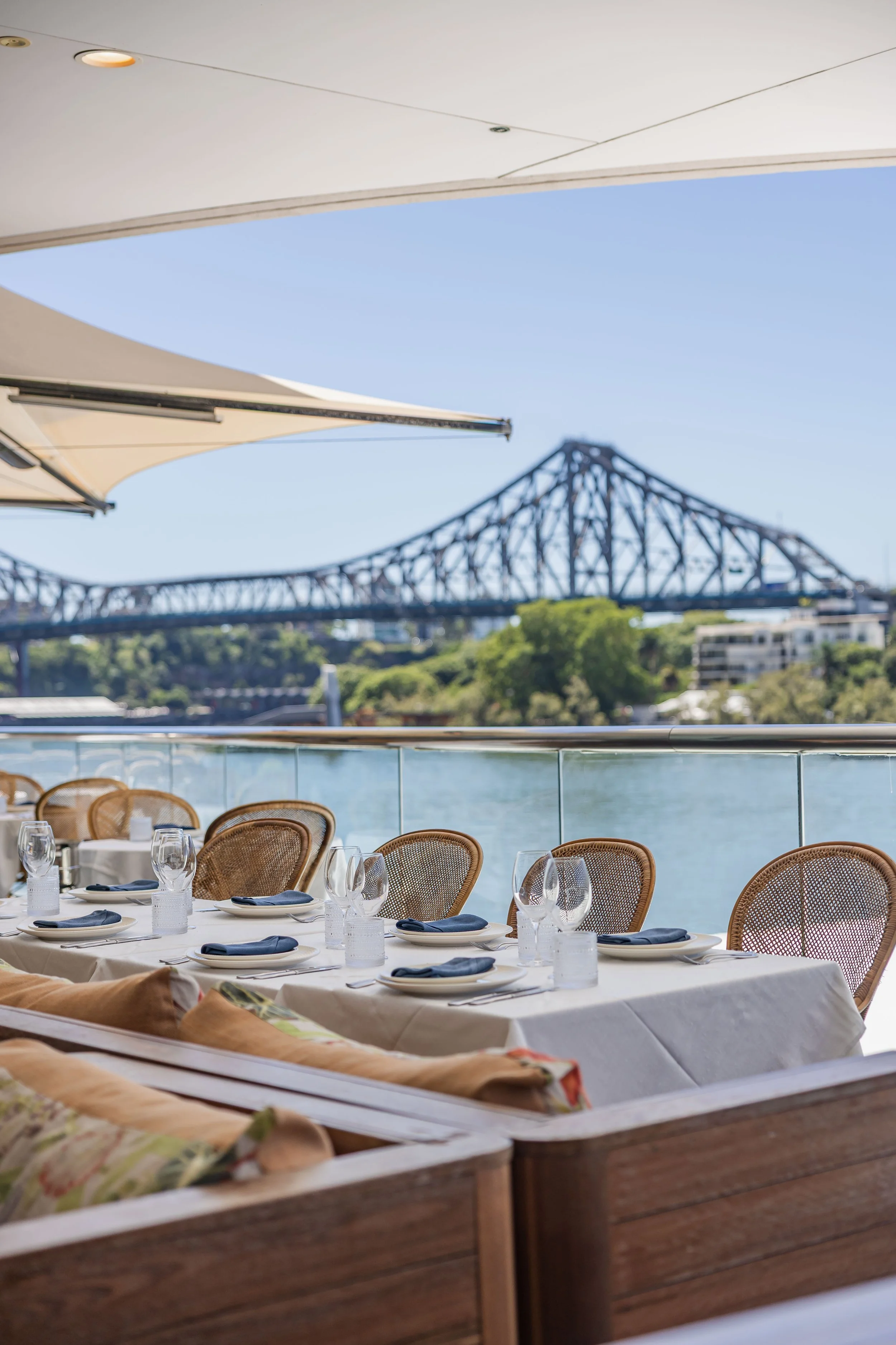Tillerman dining terrace overlooking the Story Bridge and Brisbane River at Eagle Street Pier