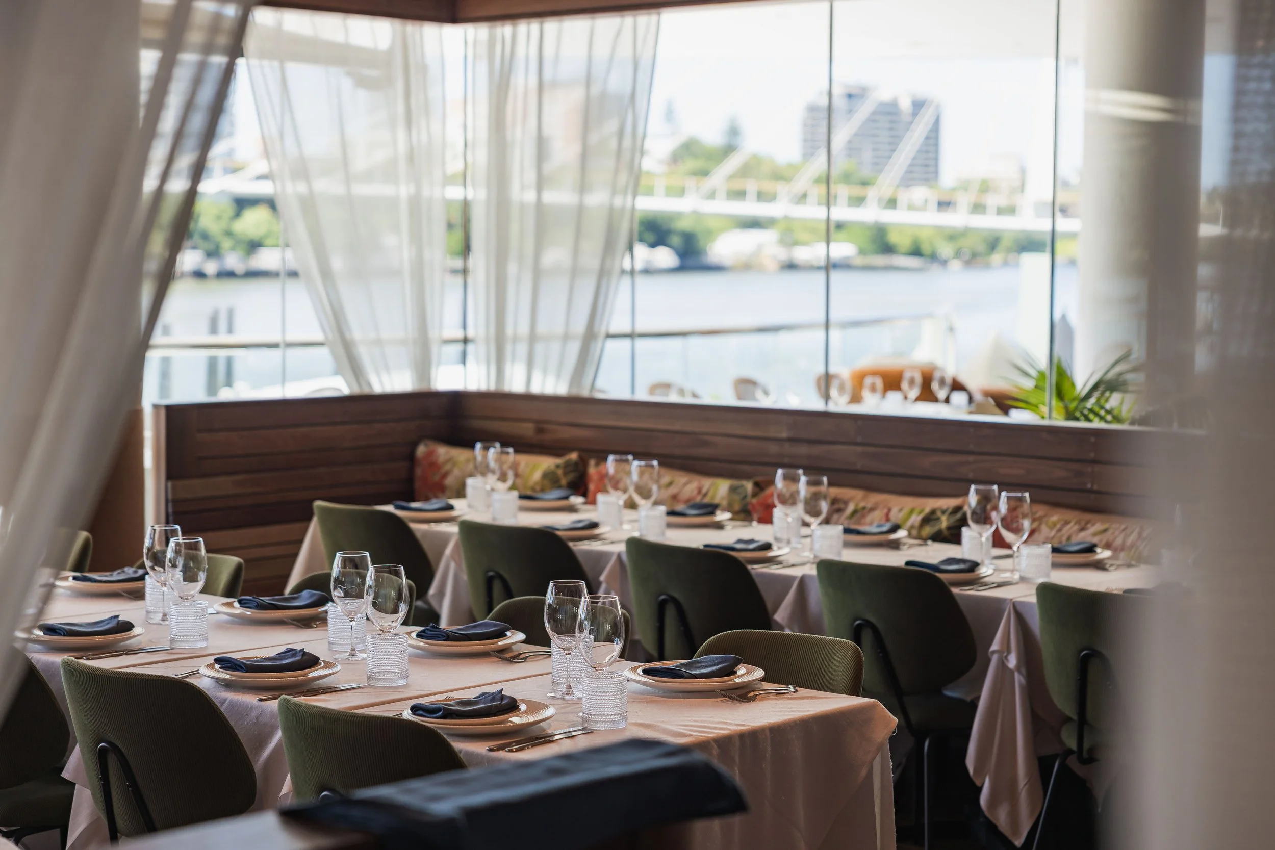 Tillerman Seafood Restaurant indoor dining room with river views, Eagle Street Pier Brisbane