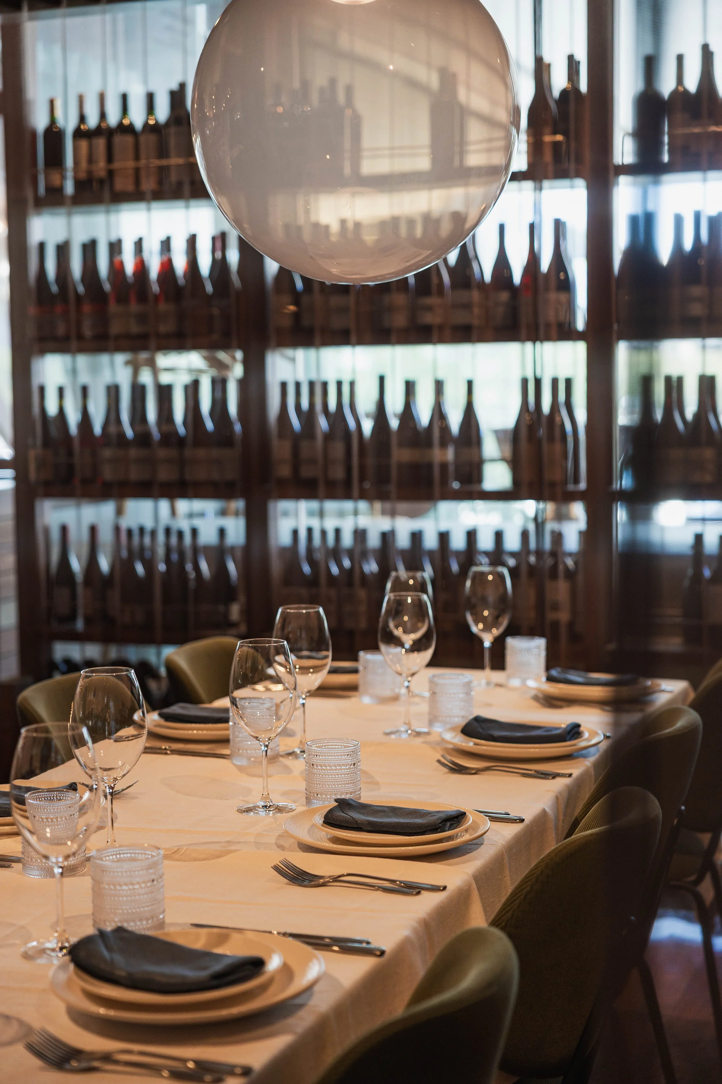 Private dining room at Tillerman Brisbane, semi-private space for up to 8 guests with wine wall