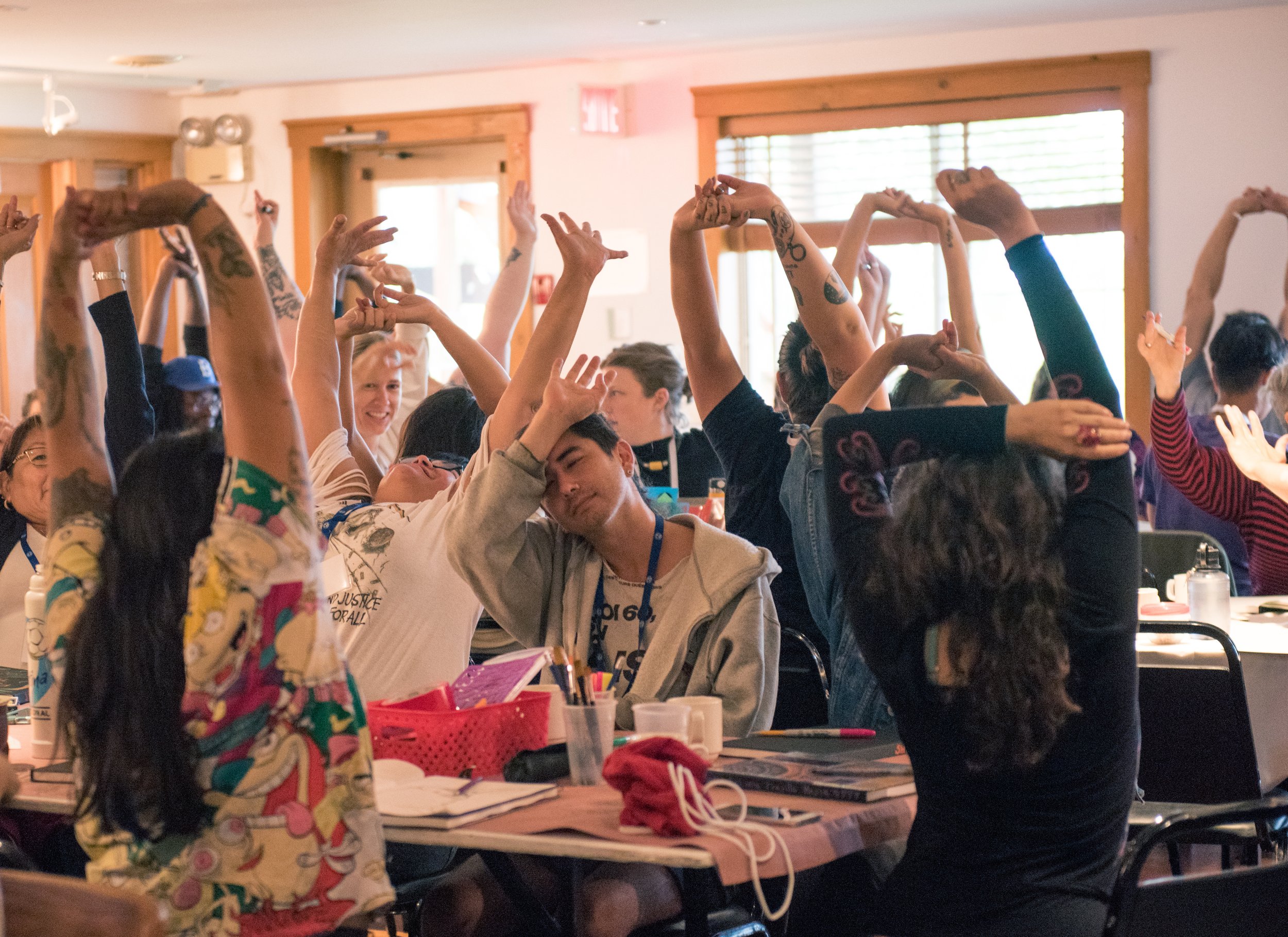 inPath Training week participants stretching during opening activity - Photo credit to Catherine Orr & inPath