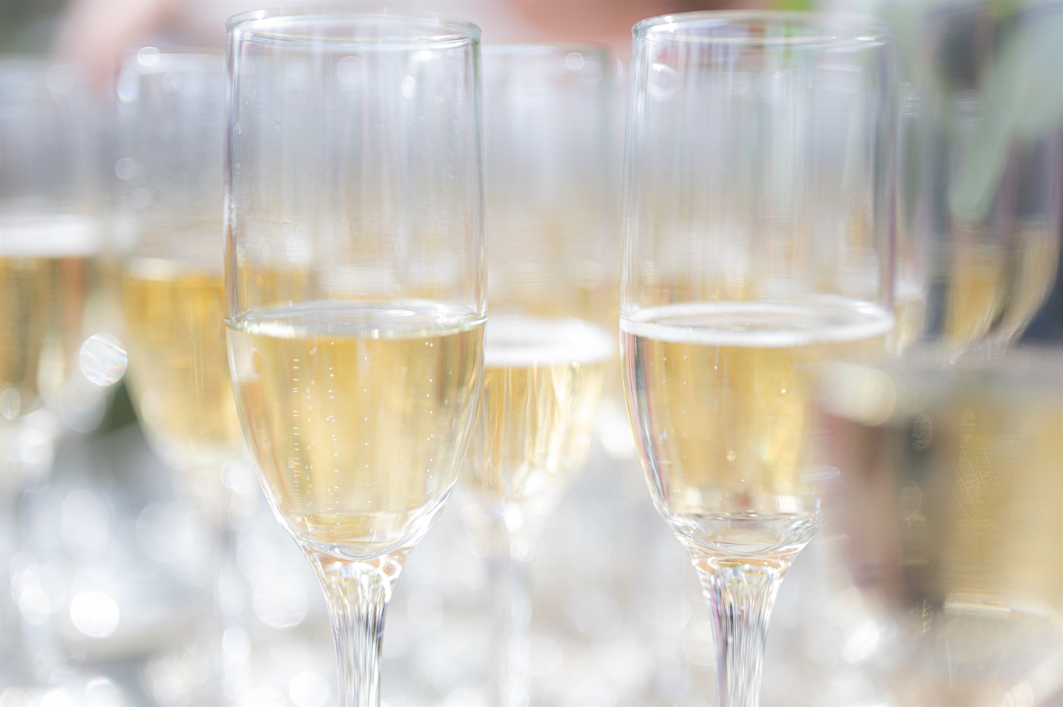 Close-up of champagne glasses with sparkling wine