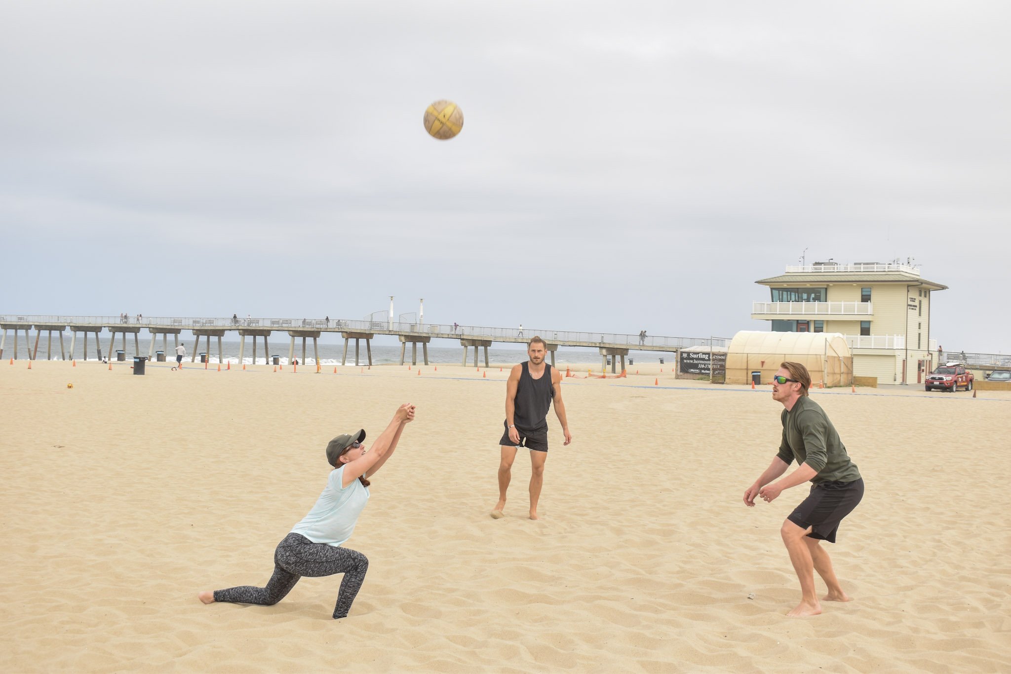 Hermosa Volleyball Academy Students in beach volleyball class working on hits