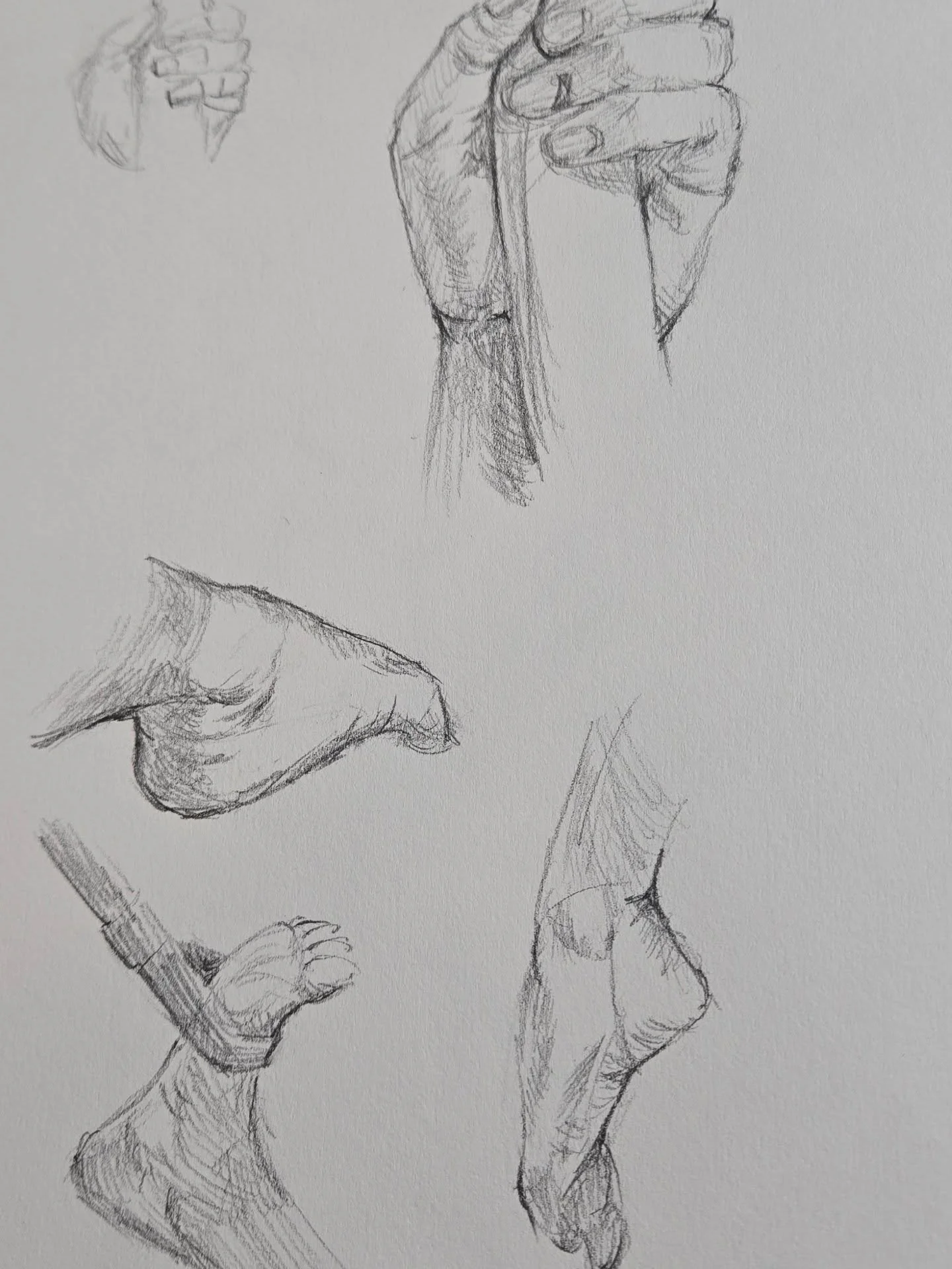 Late night hands and feet studies. Pencil on sketch pad.