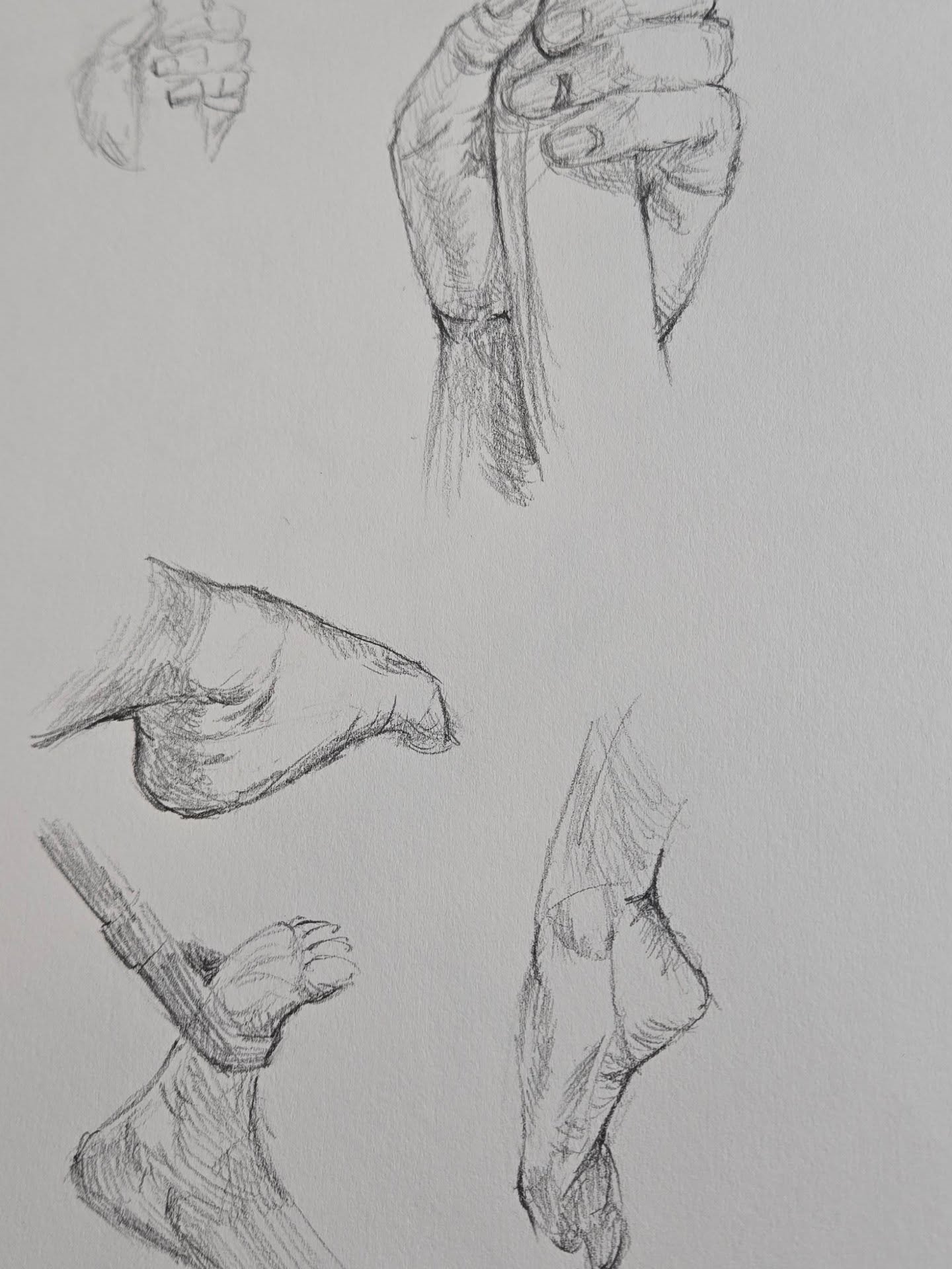 Late night hands and feet studies. Pencil on sketch pad.