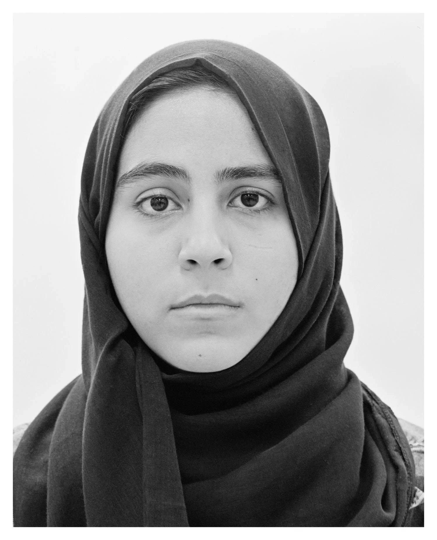 UN/Vailed | It is easy to overlook the individuality of hijabi Muslim women. Un/Vailed counters this by presenting black-and-white portraits that invite viewers to study each face closely. The women portrayed are those I’ve often been mistaken for,