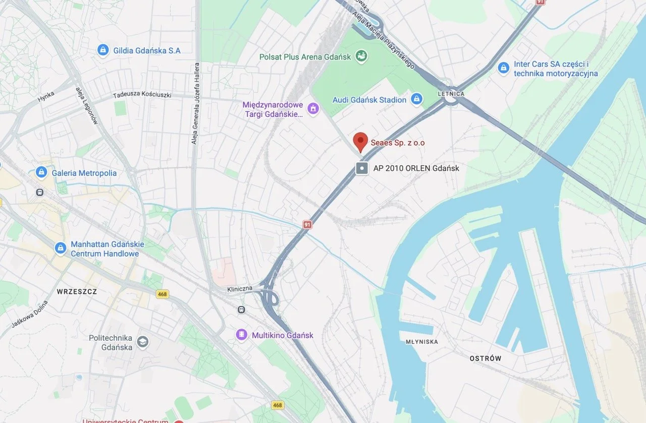 Map of Gdańsk, Poland, showing roads, landmarks, and water bodies, with a red marker indicating the location of Seaes Sp. z o.o.