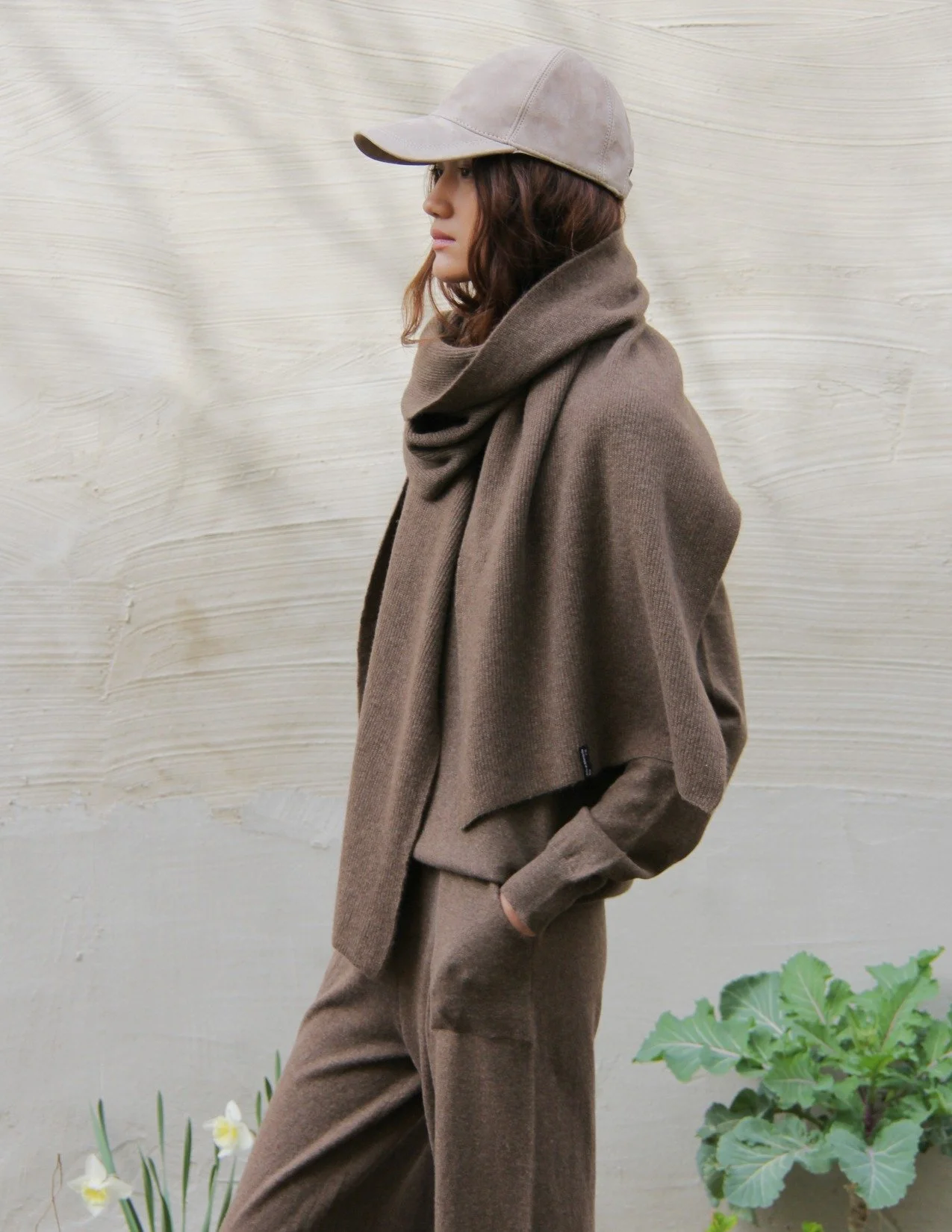 Shop a 100% Mongolian yak wool oversized scarf in natural brown. Warm and lightweight ribbed knit. Designed in Berlin and made in Mongolia by Hand of Origin.
