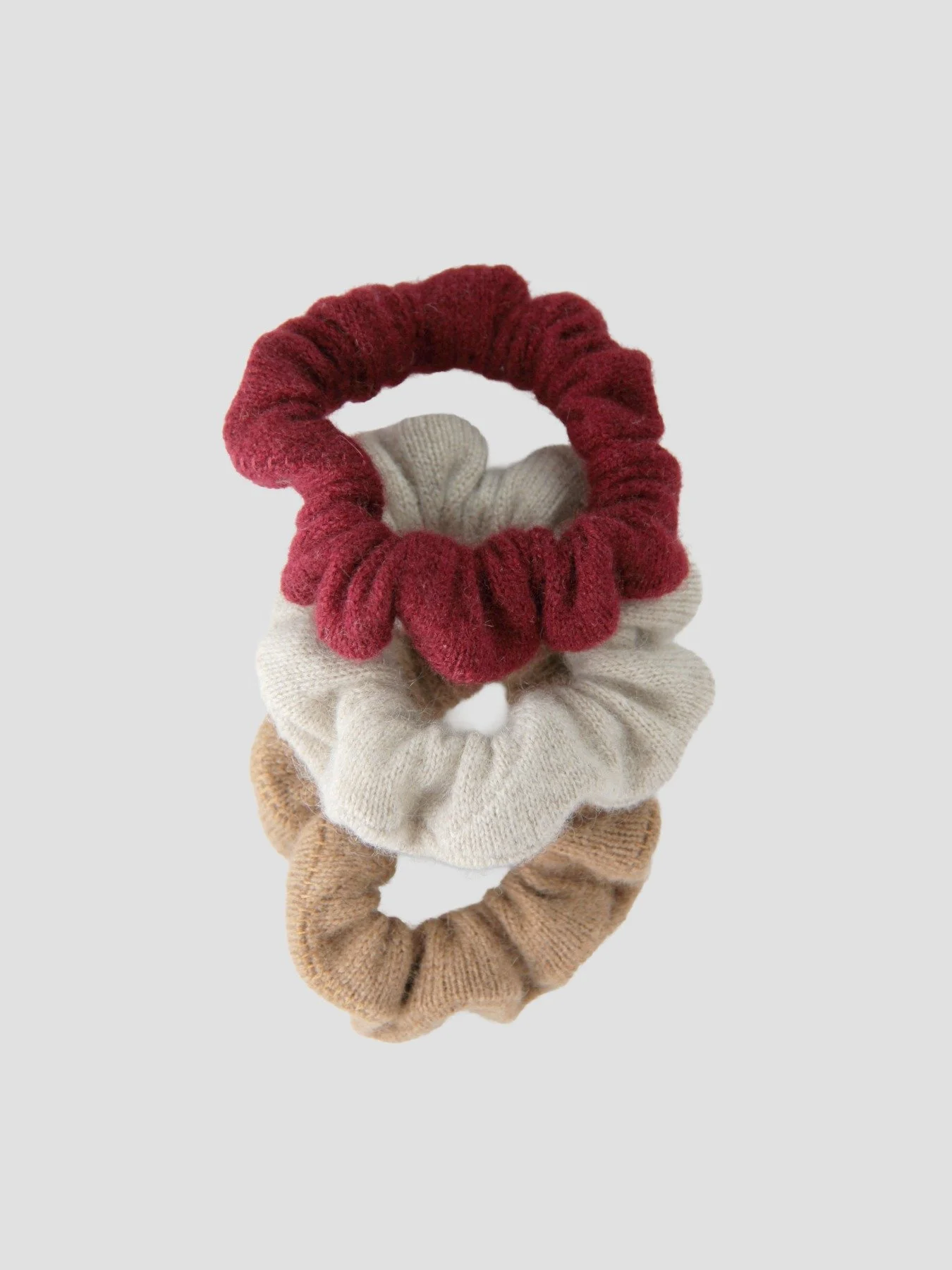 Handcrafted 3-piece hair tie set made of pure Mongolian cashmere, camel hair, and yak wool by Hand of Origin