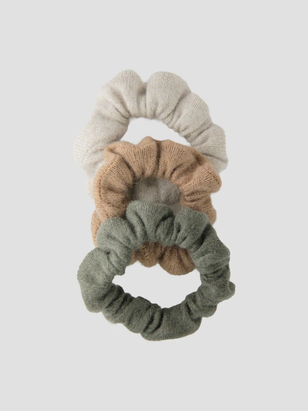 Handcrafted 3-piece hair tie set made of pure Mongolian cashmere, camel hair, and yak wool by Hand of Origin