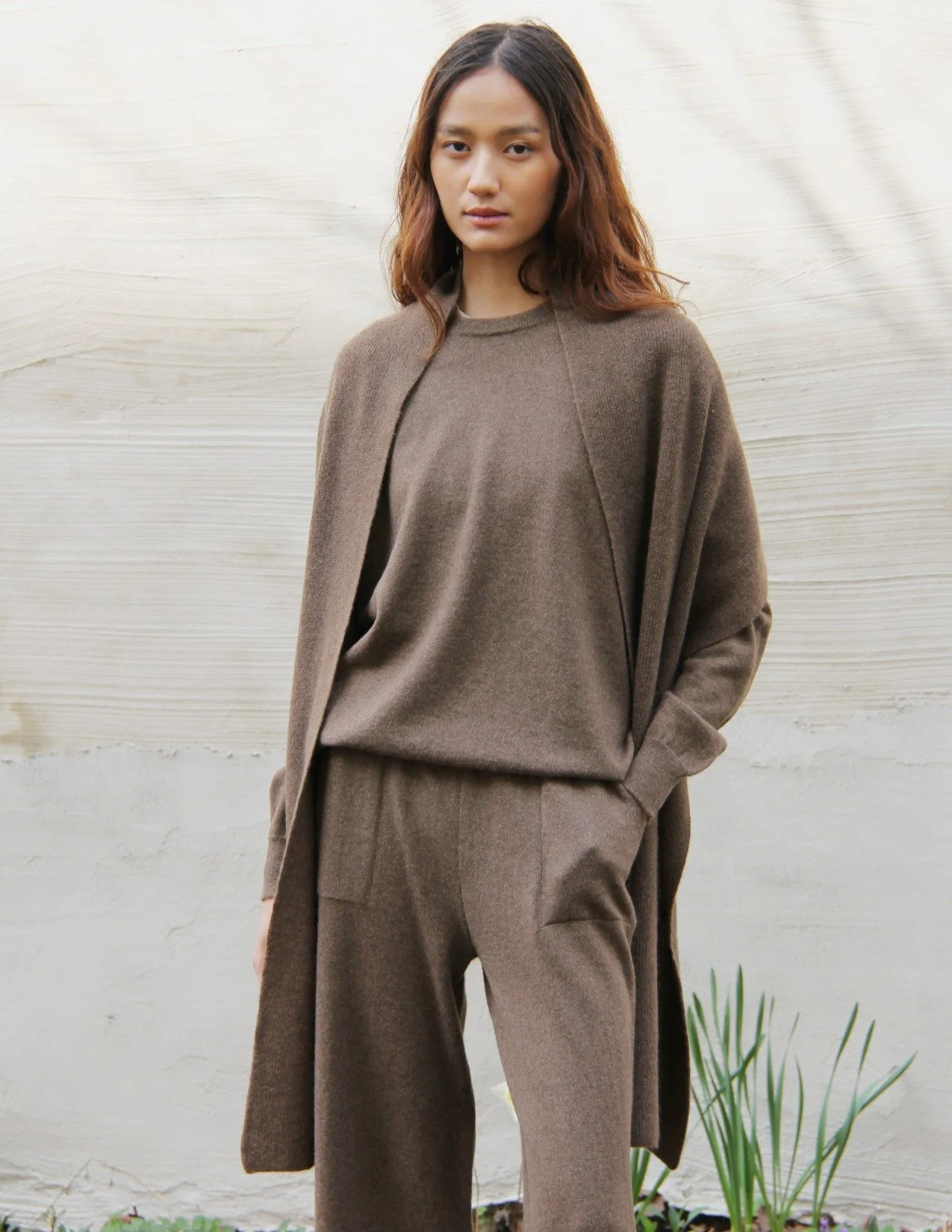 Shop a 100% Mongolian yak wool oversized scarf in natural brown. Warm and lightweight ribbed knit. Designed in Berlin and made in Mongolia by Hand of Origin.