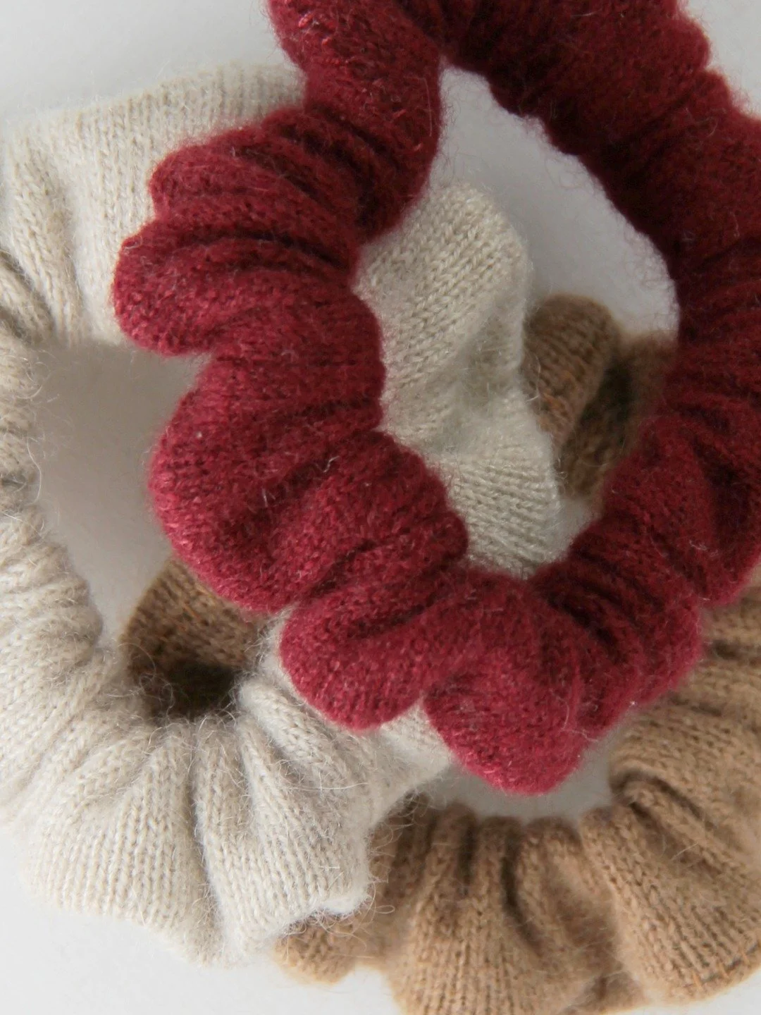 Handcrafted 3-piece hair tie set made of pure Mongolian cashmere, camel hair, and yak wool by Hand of Origin