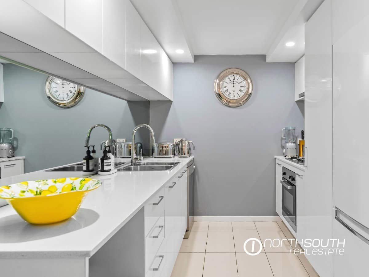 Spacious kitchen with modern appliances at 301 41 Harbour Town Drive Biggera Waters