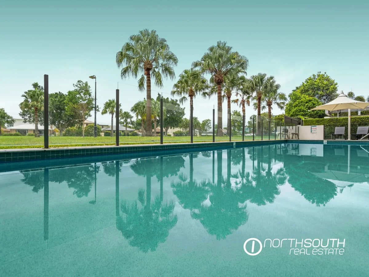 Residents Pool overlooking the park at 41 Harbour Town Drive Biggera Waters