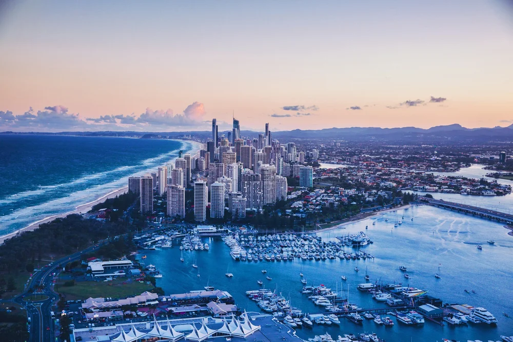 Aerial view of Gold Coast beachfront apartments, highlighting prime rental properties for investors seeking expert property management