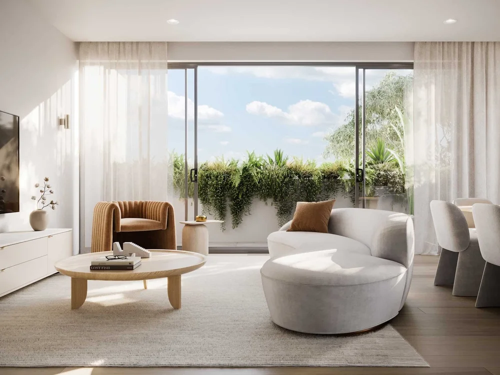 Lounge with TV and large window opening to balcony in properties for sale at very modern luxury Gold Coast residences