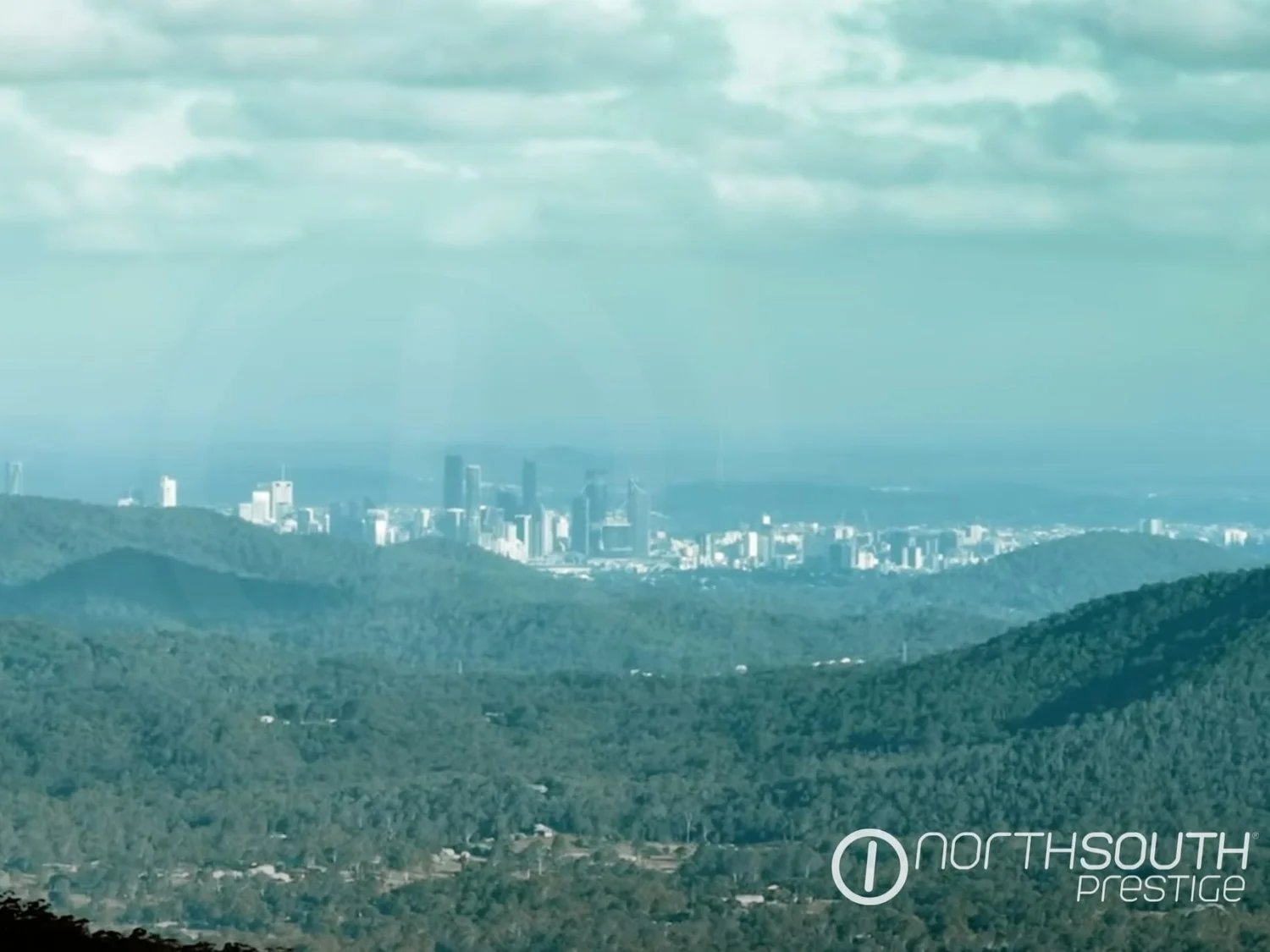 The Brisbane City skyline seen across the ranges from the Samford Valley hinterland