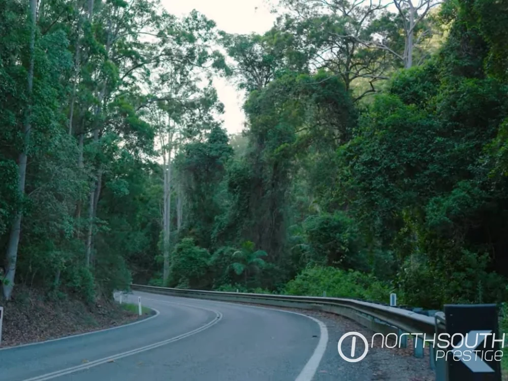Access road leading through Samford Valley 1,000 acres development property for sale