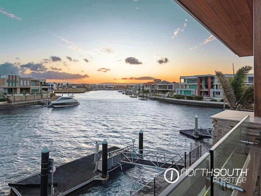 Pontoon visible from balcony at back door of Sovereign Islands Gold Coast property featured in properties for sale