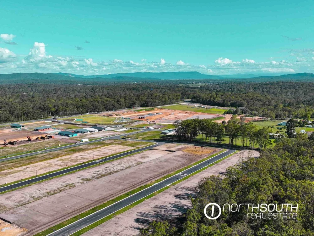Drone aerial image showcasing Chambers Flat designer homes available in house and land properties for sale