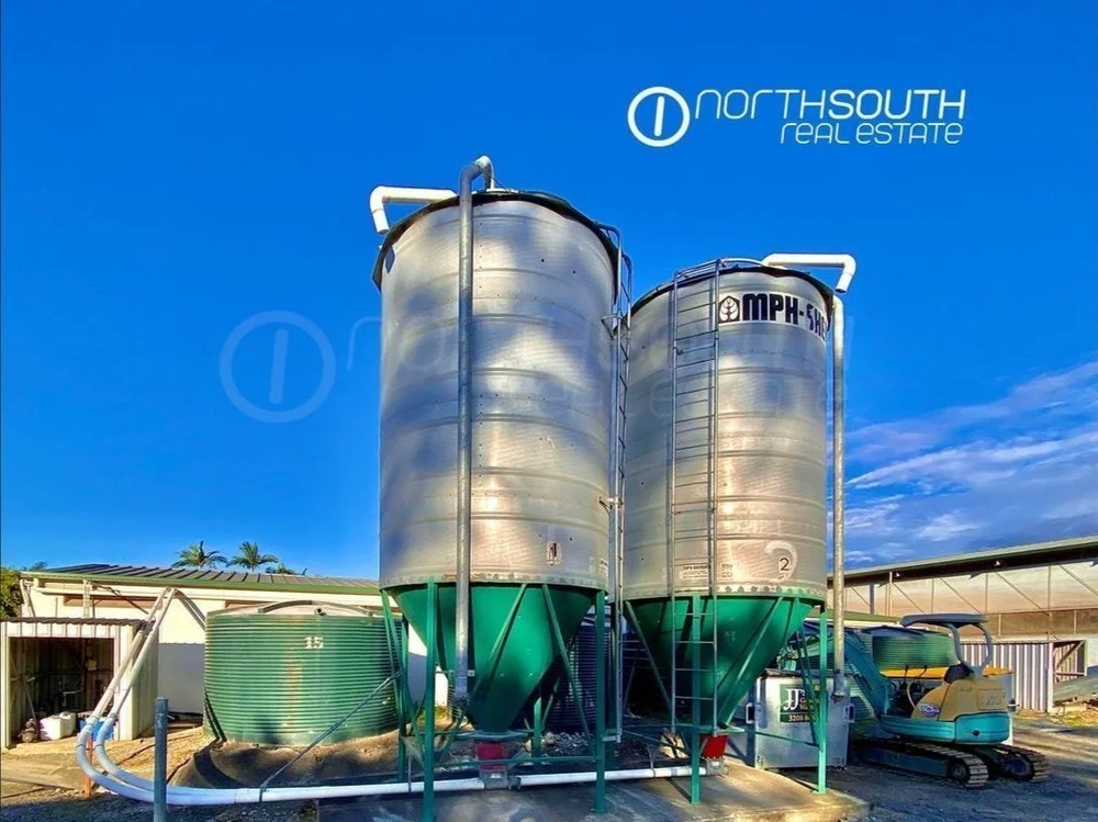 Grain silos at egg farm on Pimpama Jacobs Well Rd Norwell featured in properties for sale