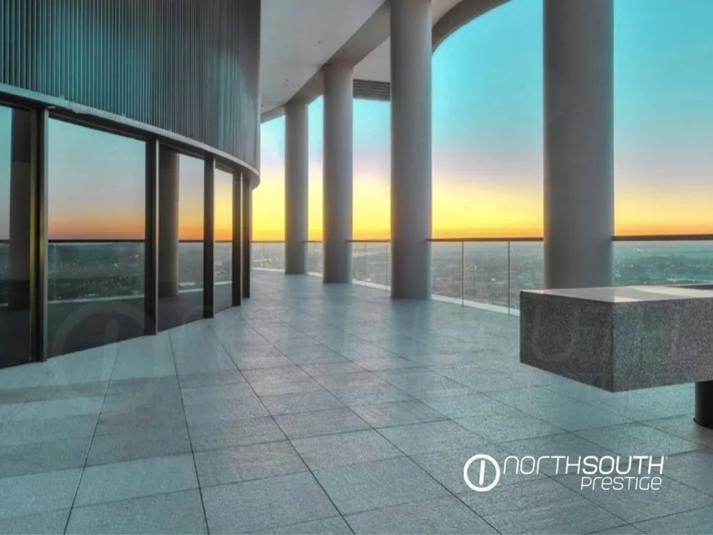 Balcony seating and open plan living – Brisbane properties for sale Riparian Plaza apartment