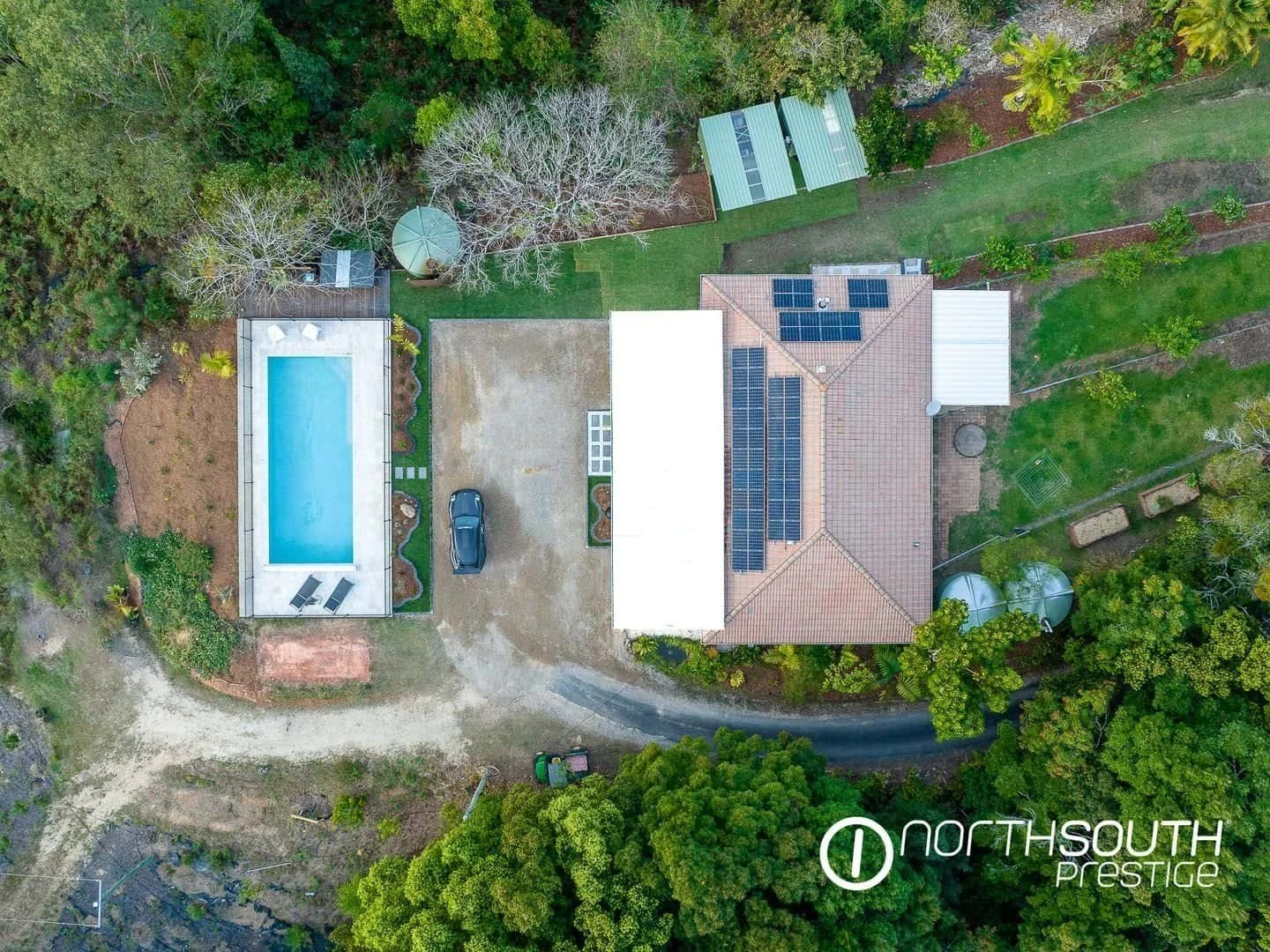 Aerial drone footage of the house and yard at properties for sale northern nsw nobbys creek 100 acres.