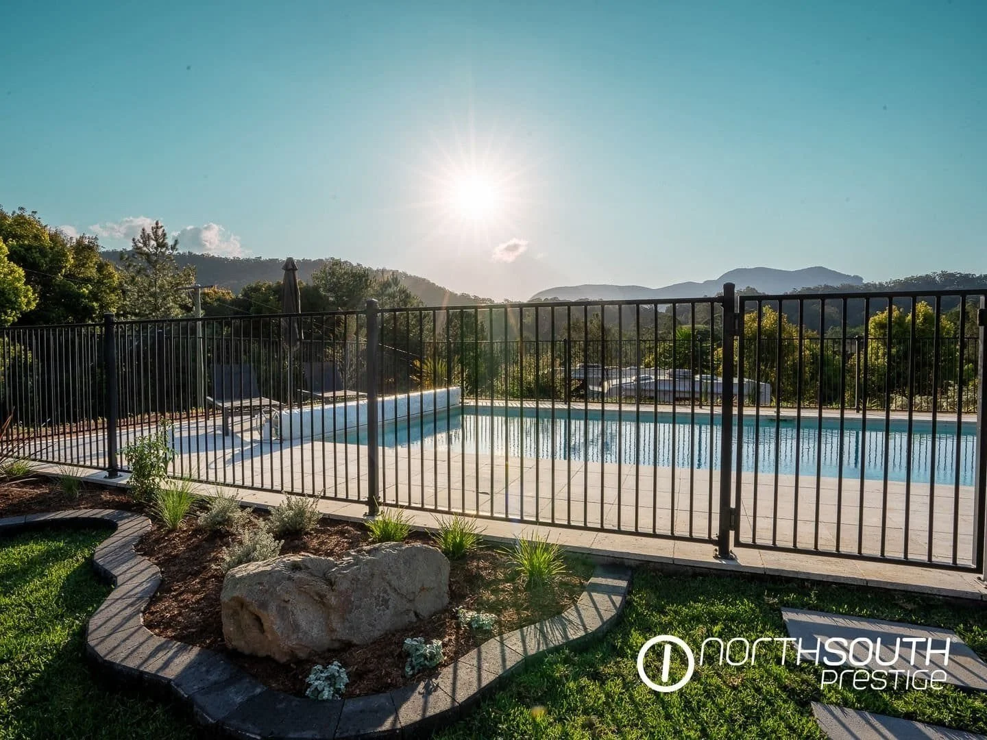 Pool with landscaped gardens at properties for sale northern nsw nobbys creek 100 acres.