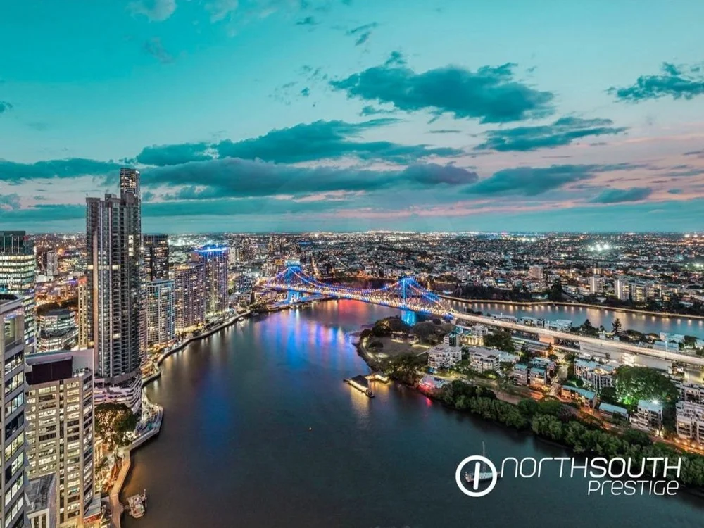 Brisbane skyline with city lights view at properties for sale Brisbane riparian plaza apartment 4202.