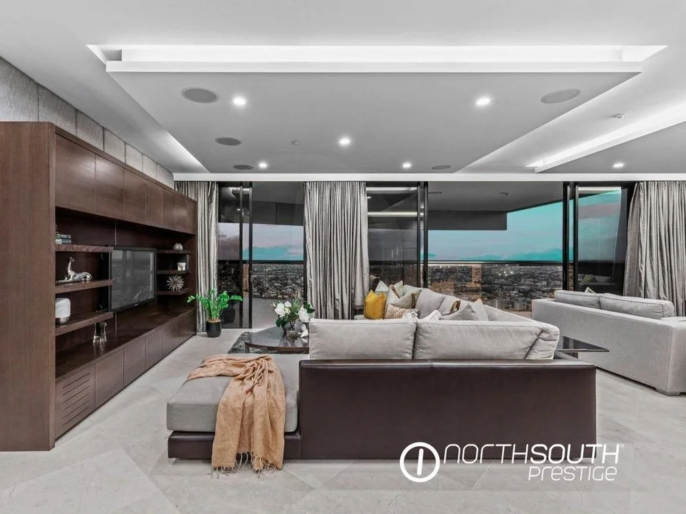 Large lounge room at properties for sale Brisbane riparian plaza apartment 4202.