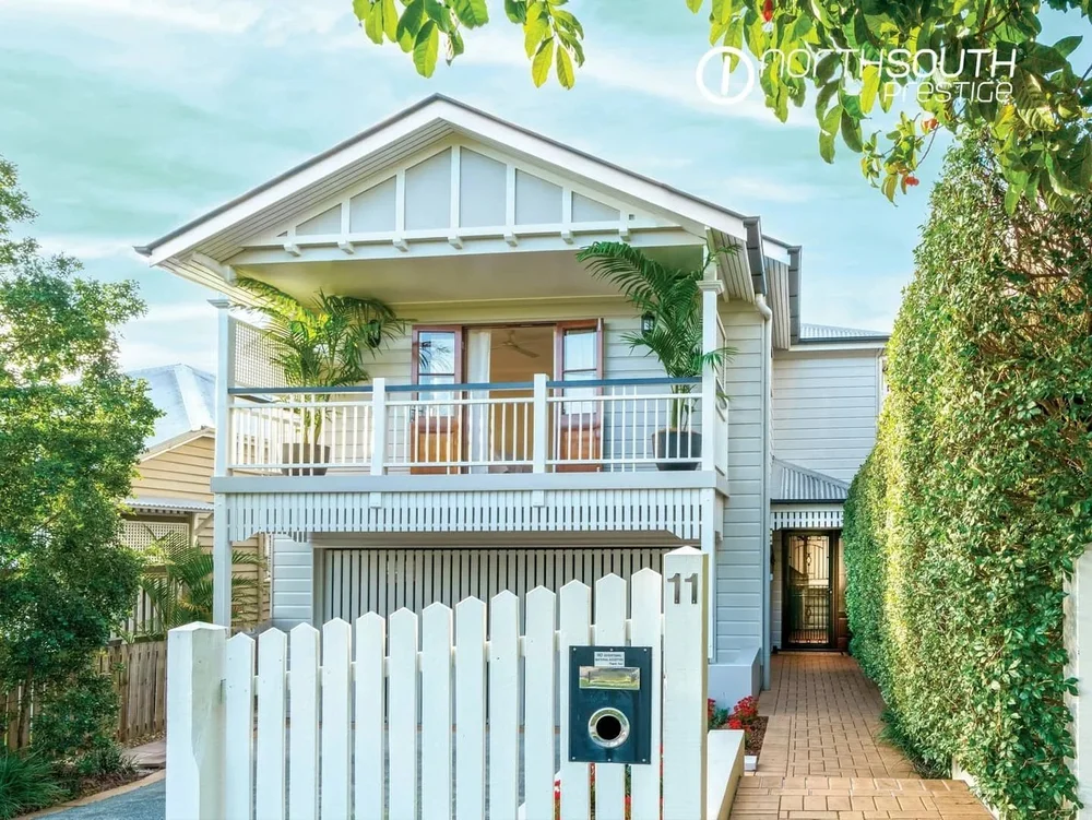Image of properties for sale Brisbane in Bardon front of the house with landscaped entry and facade.