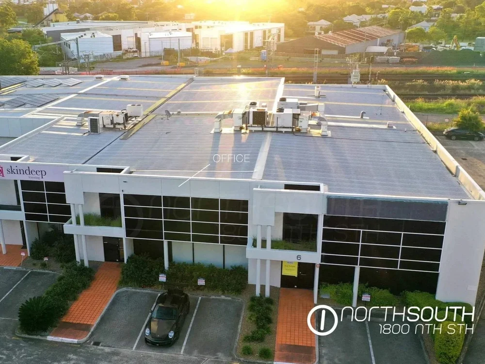Image of brisbane commercial property for sale aerial view showing the front and parking at 7/10 Hudson Road, Albion.