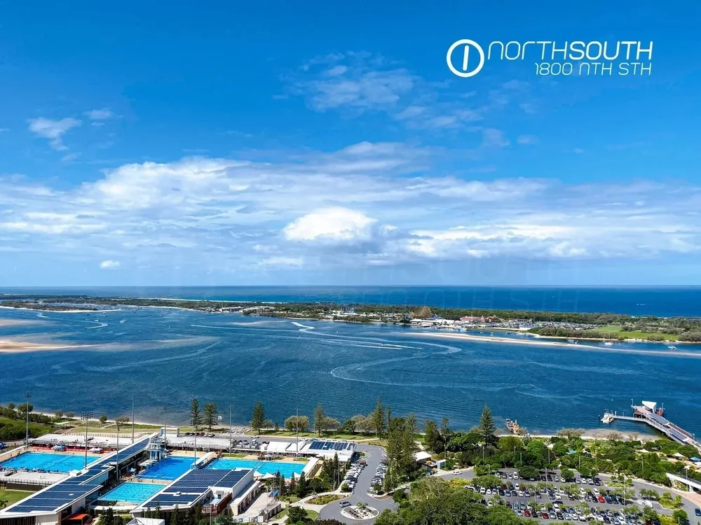 Image of properties for sale gold coast southport apartment penthouse balcony view of the water.