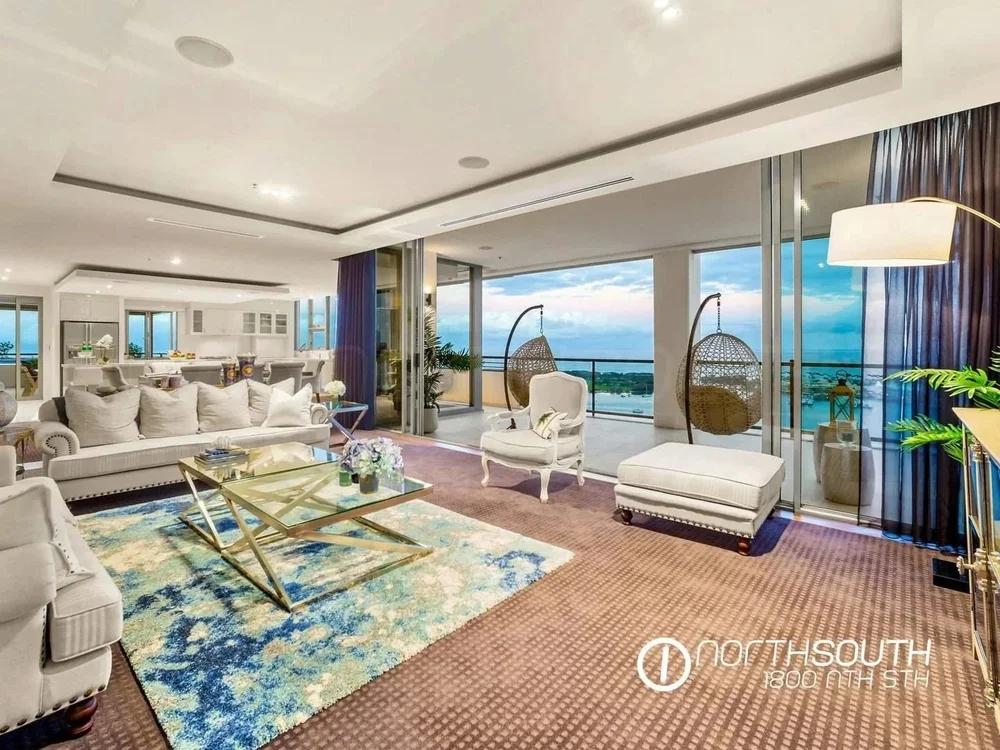 Image of properties for sale gold coast southport apartment penthouse view from multiple windows across living areas.
