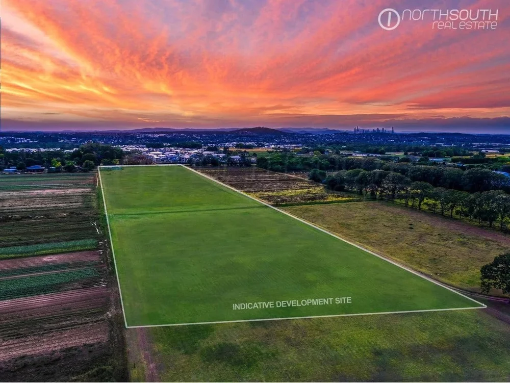 Image of properties for sale Brisbane property development rochedale site aerial view of the 9.7-acre vacant land.