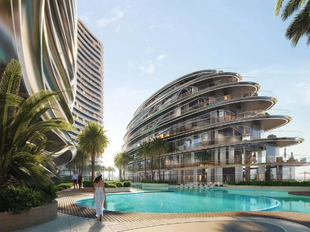 Poolside leisure view at Binghatti Aquarise, highlighting modern properties for sale Dubai luxury apartments.