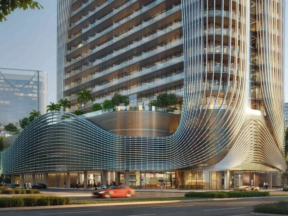Skyhall Binghatti illuminated at night, premium properties for sale Dubai cityscape