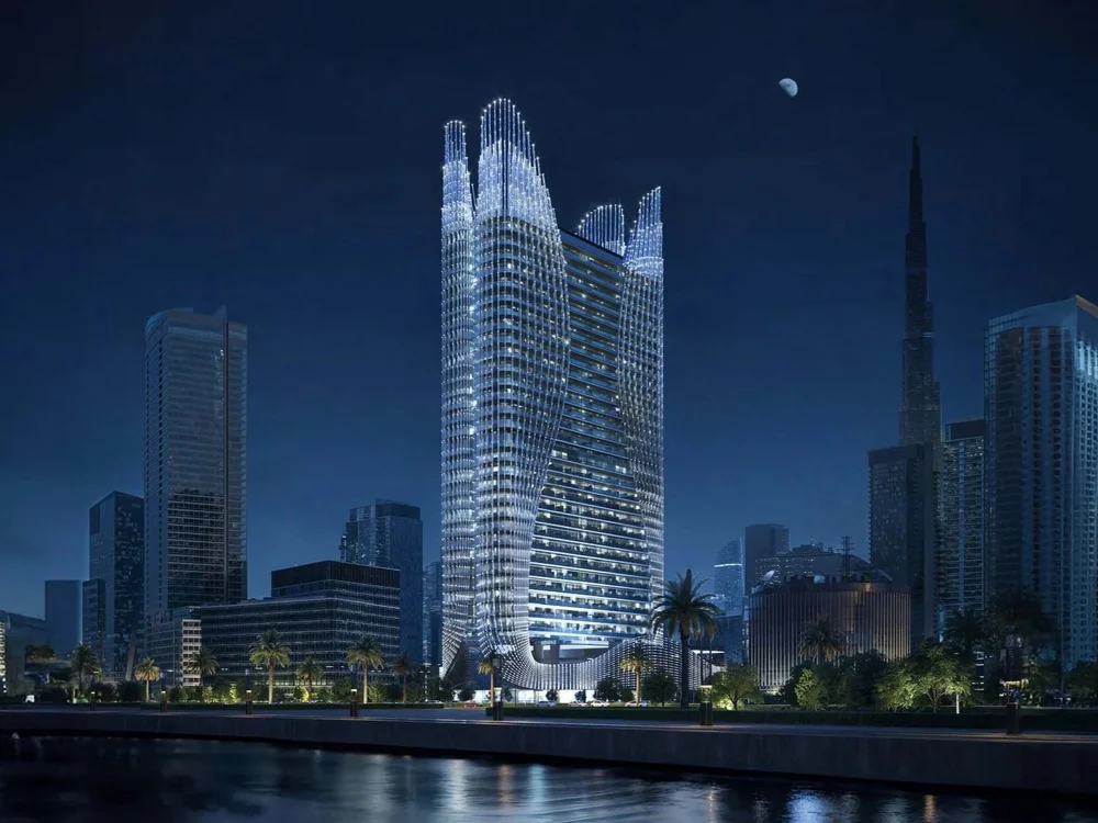Skyhall Binghatti illuminated at night, premium properties for sale Dubai cityscape