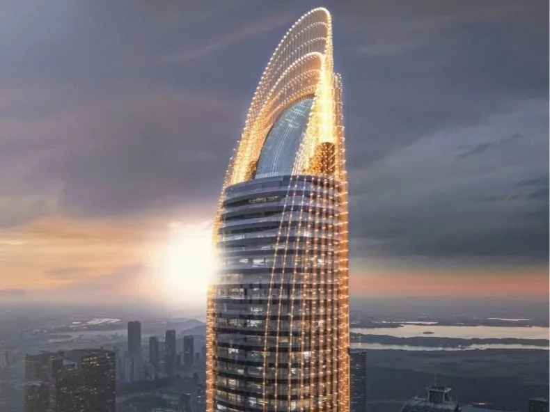 Luxury properties for sale Dubai Binghatti Skyblade – glowing tower top during sunset in Downtown Dubai
