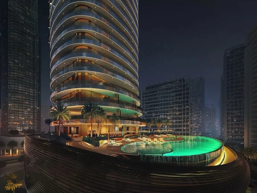 Luxury properties for sale Dubai Binghatti Skyblade – glowing tower top during sunset in Downtown Dubai