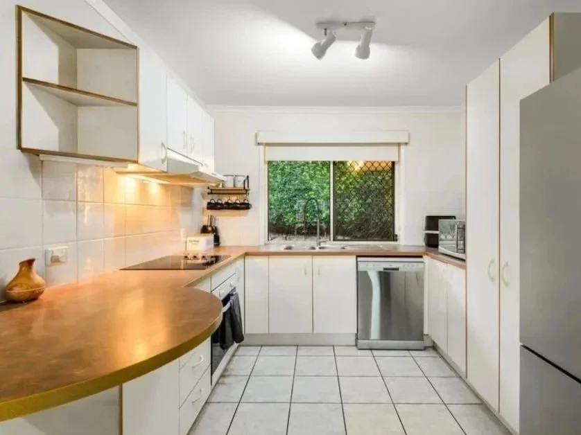 Kitchen with practical storage, stainless appliances and natural light at 13 Turquoise Crescent Griffin purchased through buyer advocacy.