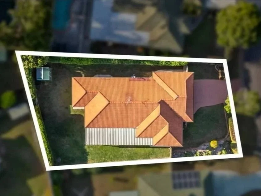 Drone aerial showing roof layout and full block footprint of 13 Turquoise Crescent Griffin highlighting generous land size 