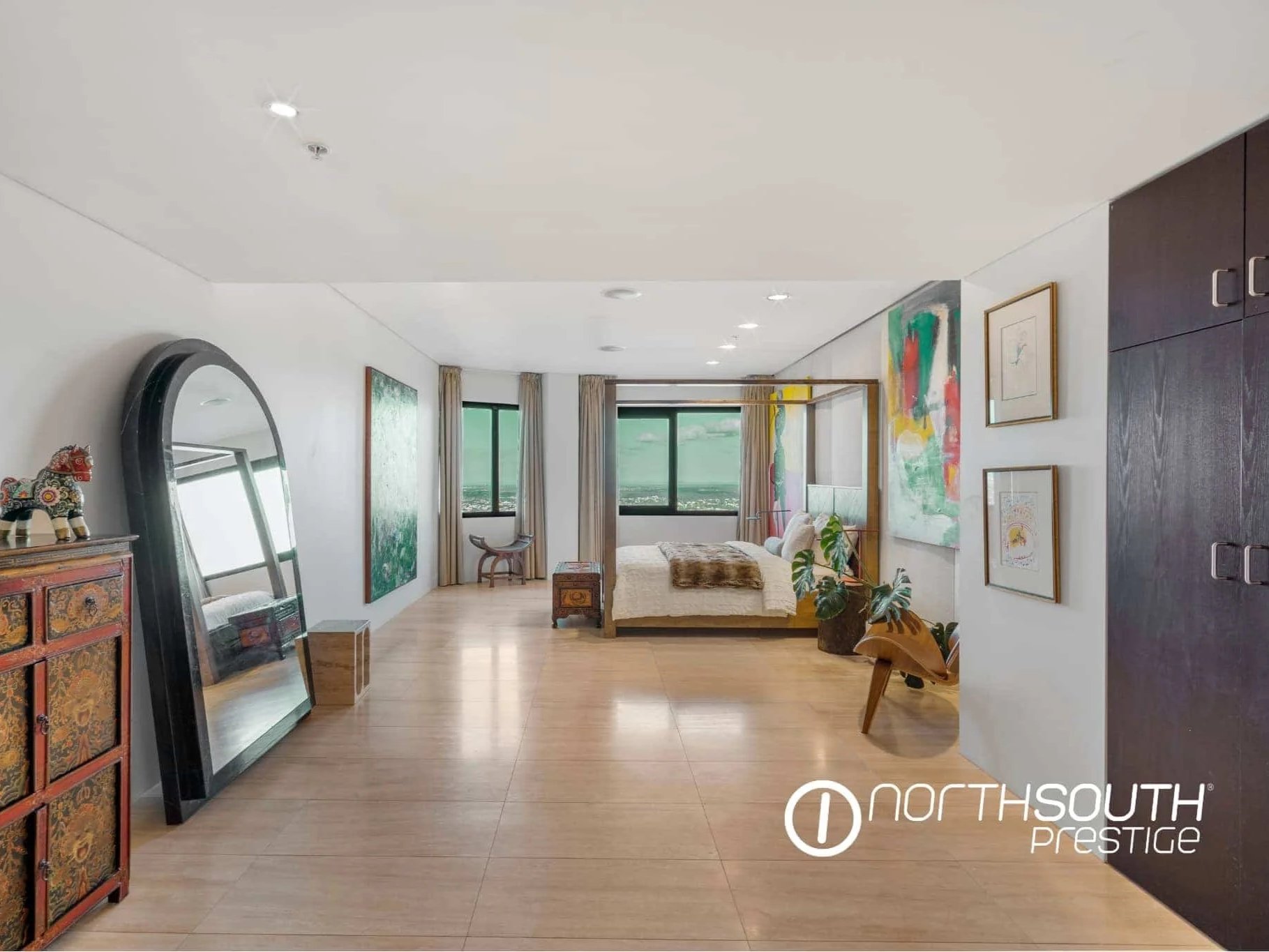 Master bedroom with city views – Brisbane properties for sale Riparian Plaza apartment 5002 