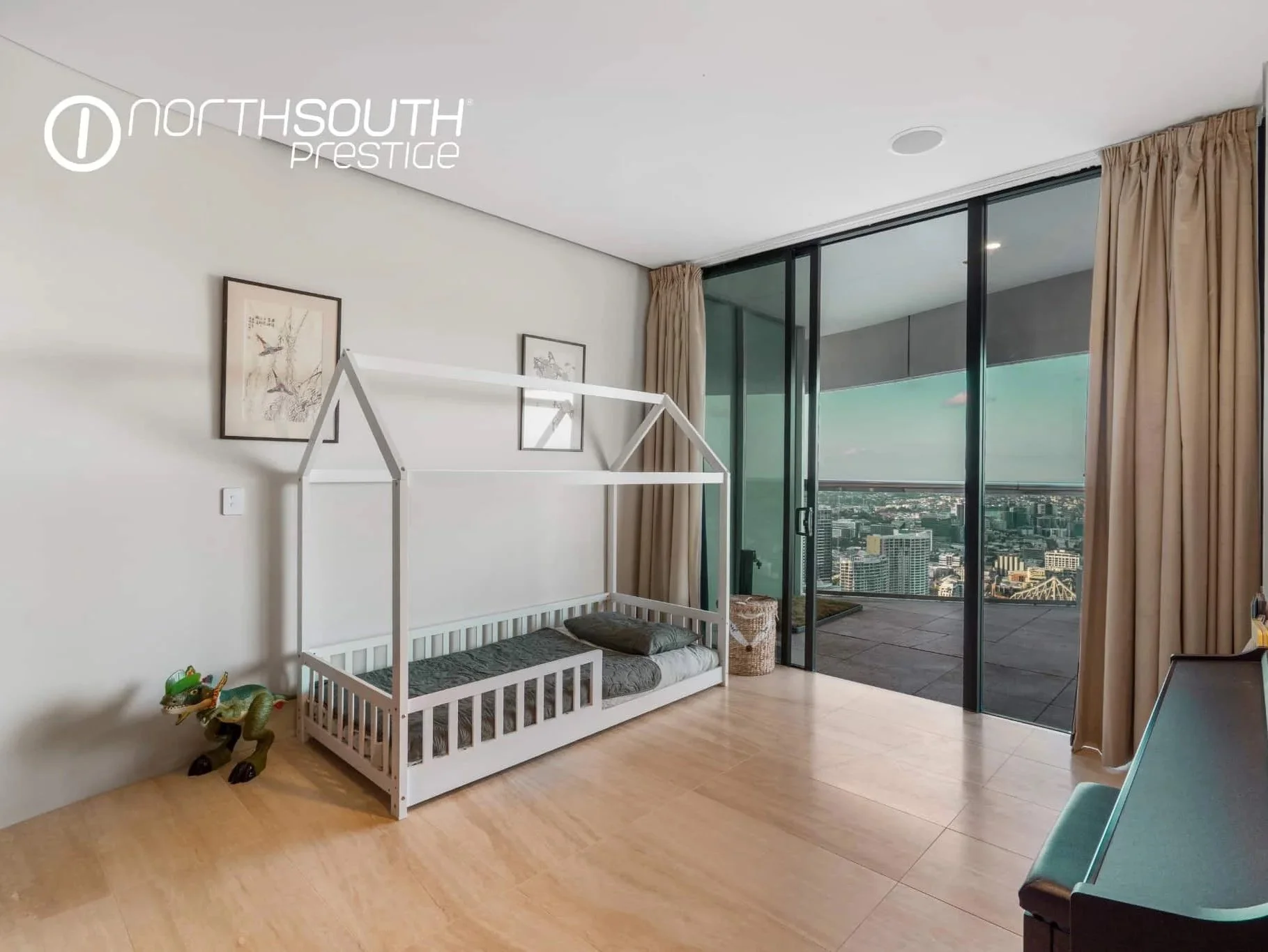Children's bedroom with piano overlooking the city – Brisbane properties for sale Riparian Plaza apartment 5002 