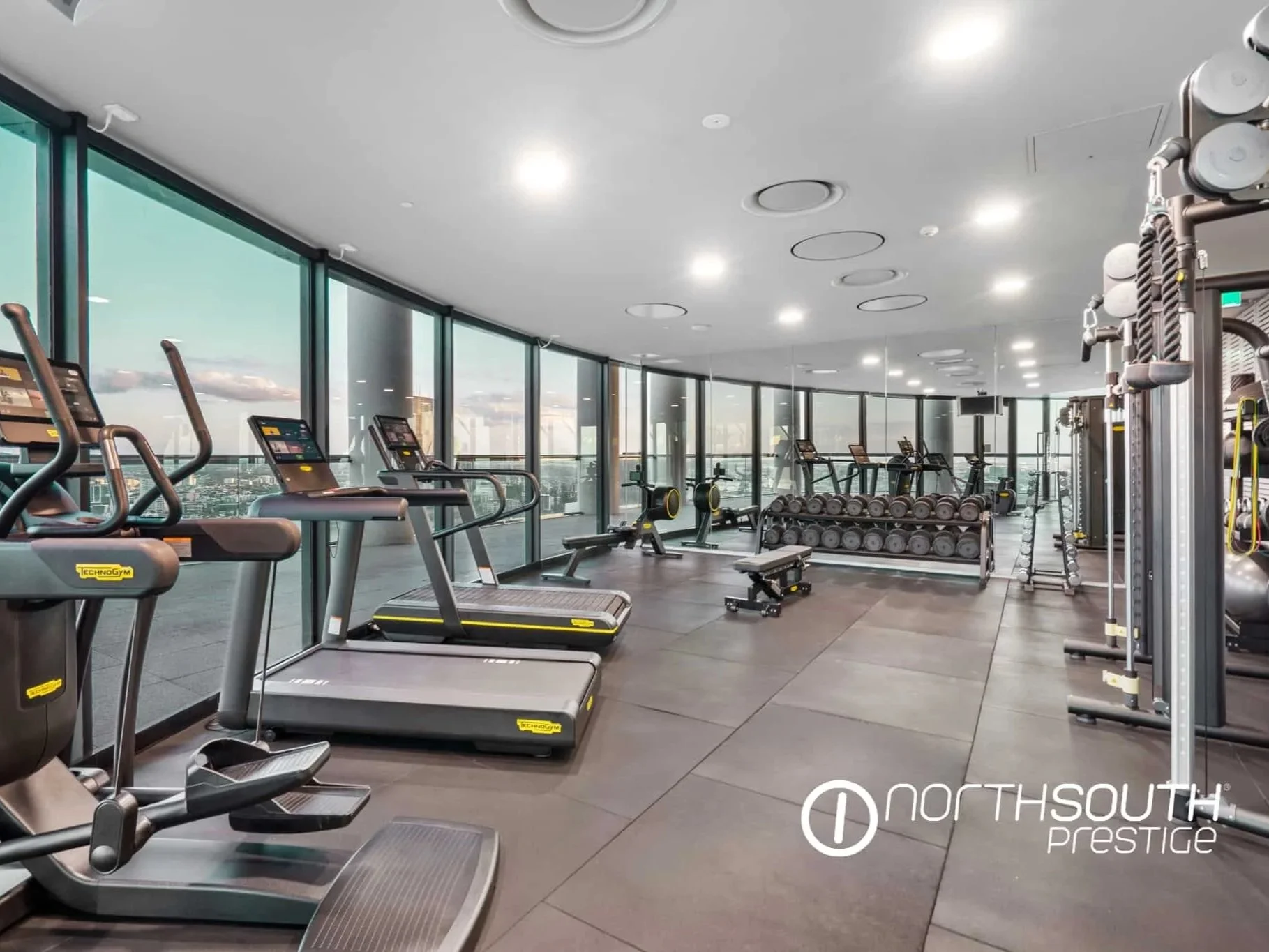 Recreational Facilities Level 39 gymnasium with sunset views – Brisbane properties for sale Riparian Plaza apartment 5002 