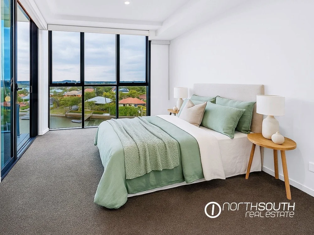Master bedroom with ensuite in WaterPoint Residences showcasing contemporary coastal properties for sale