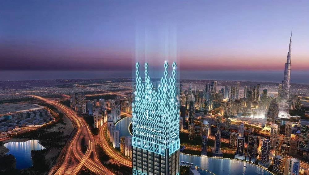 A city skyline at dusk with the tall Dubai Burj building on the right. The building in the foreground has a futuristic design with blue neon lights and signs that read