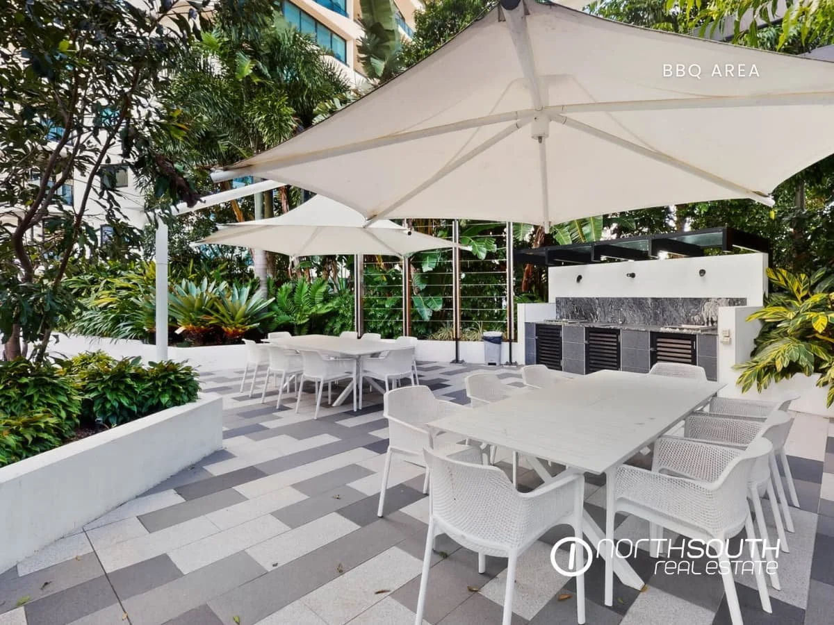 Barbecue and entertainment area at Waterpoint Residences, Biggera Waters QLD. 