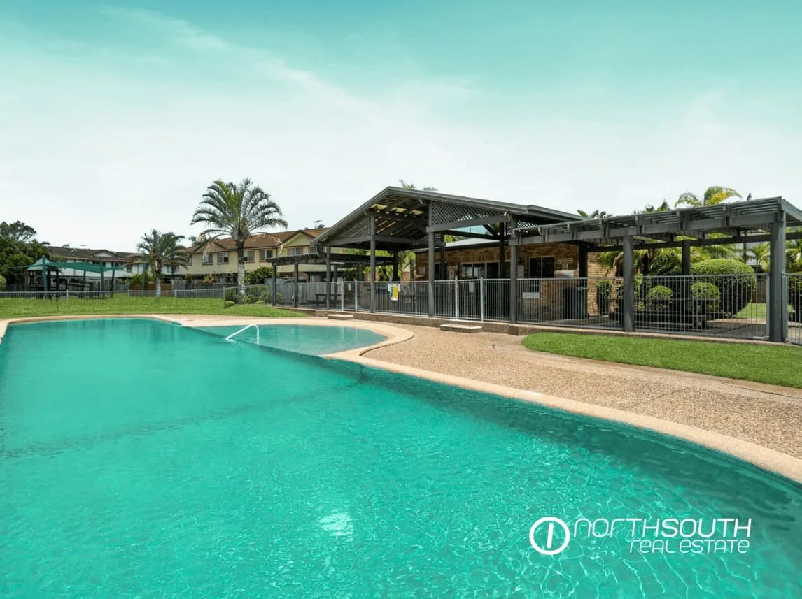 Swimming pool and residents’ clubhouse within established Thorneside townhouse complex, QLD