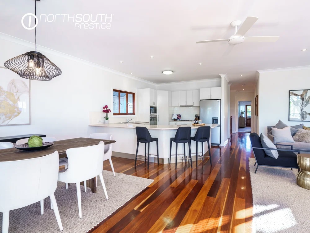 Image of properties for sale Brisbane in Bardon dining room with natural light and open-plan layout.
